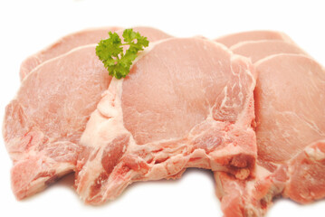 Lean Cut Pork Chops Isolated Over a White Background	