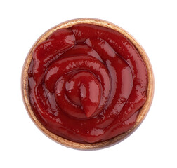 Top view of tomato ketchup sauce in wooden bowl isolated on white background.