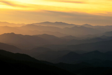 Warm sunset light illuminating many layers of ridges in the Great Smoky Mountains National Park
