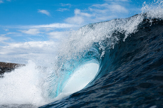Foamy waves rolling up in ocean