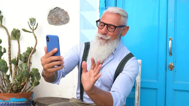 Senior man with a phone