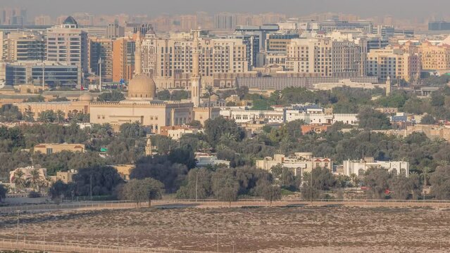 Aerial view of mosque and neighbourhood Deira on a background timelapse. Dubai, United Arab Emirates