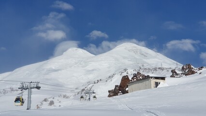 Elbrus in the snow sky clouds mountains extreme