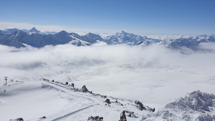 Mountains Snow horizon sky clouds at the top altitude
