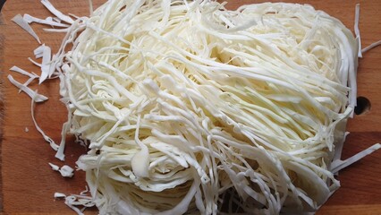 Shredded cabbage on the kitchen table