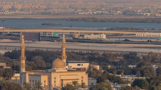 Aerial view of mosque and neighbourhood Deira on a background timelapse. Dubai, United Arab Emirates