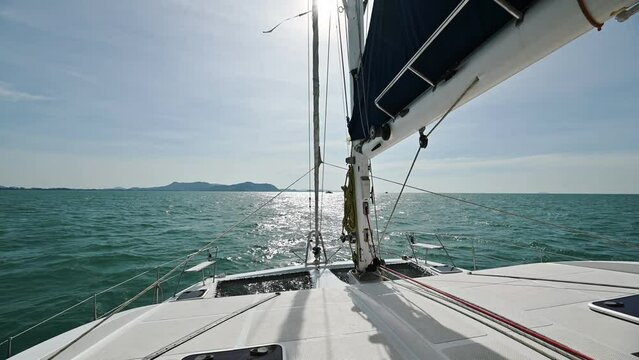 Luxury yacht sailing in tropical sea on windy and monsoon day