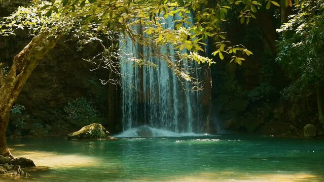 Beautiful waterfall and emerald pool in tropical rain forest in Thailand..