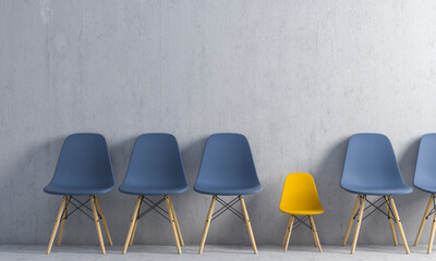 Obraz premium row of chairs in the waiting room, one is much smaller.