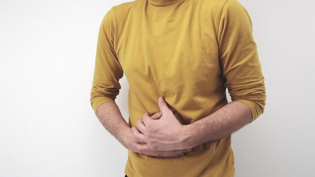 Man with stomach ache and digestive issues.