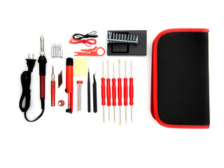 A soldering toolset in a black case isolated in a white background.Black bag with soldering...