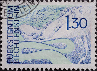LICHTENSTEIN - CIRCA 1973: a postage stamp from LICHTENSTEIN , showing a landscape with buildings...