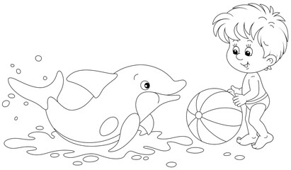 Happy little boy and a merry playful dolphin playing a big striped ball on a summer beach beside a sea, black and white outline vector cartoon illustration for a coloring book page