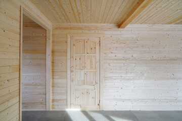 Wooden room design with door, new house built 