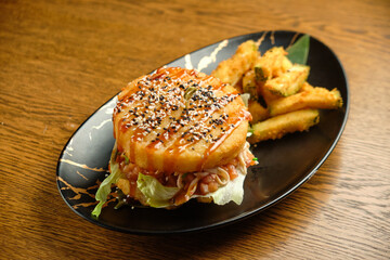 Pumpkin burger with nuts and chickpeas with tomato salsa, spinach