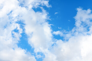 Blue sky with clouds. Sky background. Selective focus