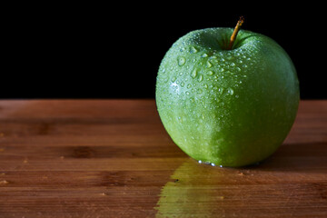 green apple with drops