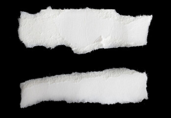 a white piece of paper on a black isolated background