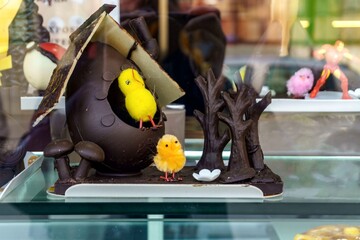 Mona de Pascua, a typical Easter cake eaten in Spain on Easter Monday, decorated with a chocolate...
