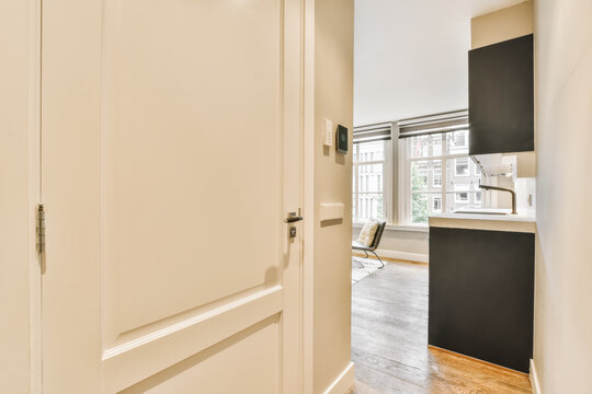 Closed doors in light corridor in flat