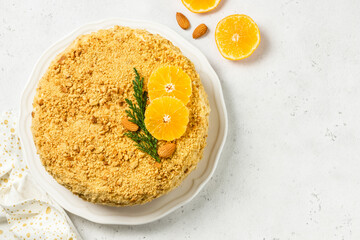 Citrus honey cake on plate. Top view.