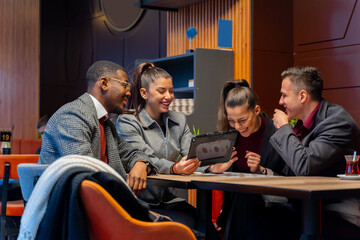 Looking at the plans and ideas while laughing together and sitting in the cafe