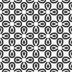 Abstract vector seamless pattern. Simple background with stylized petals. Black and white background.