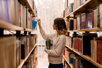 Girl looking for a book