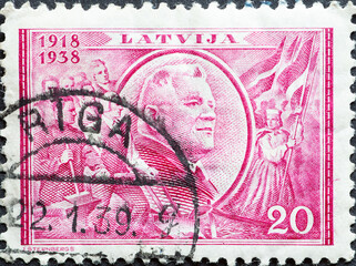 Latvia - circa 1938: a postage stamp from Latvia , showing a portrait of President Kārlis Ulmanis...
