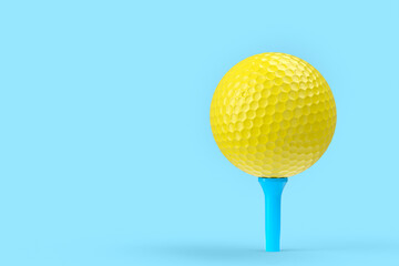 Yellow golf ball on tee isolated on blue background