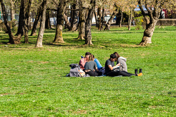 People in the park in Bucharest, Romania, 2022