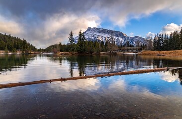 Moody Reflections On A Banff Lake