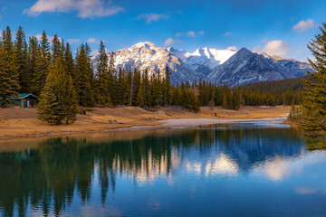 Fototapeta na wymiar Reflections On Cascade Ponds In Banff National Park
