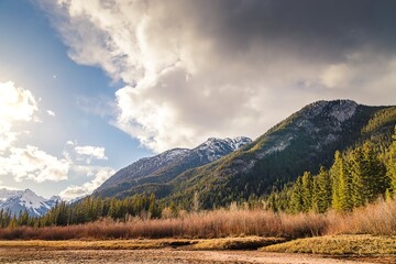 Sunlit Clouds Over Banff Mountains