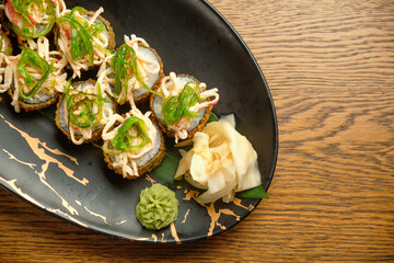 A set of hot sushi rolls with salmon