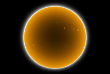 Sun in dark space with solar spots on the 26th April 2022