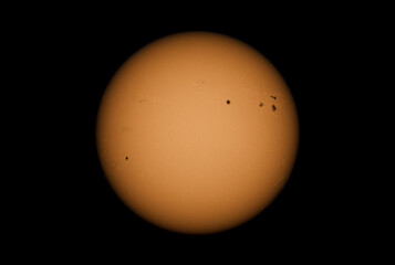 Sun in dark space with solar spots on the 26th April 2022