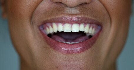 African black woman talking to camera, close-up mouth in conversation talking