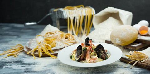 Cooking Seafood Pasta. Photo of food on a dark background