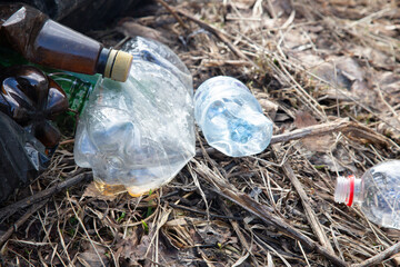 Garbage collection in the spring in the park.Bags of garbage on the street.