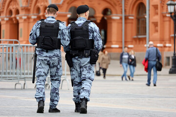 Russian military forces in bulletproof vests patrol the Red square in Moscow