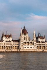 Naklejka premium view from the Danube River to the panorama of the Hungarian Parliament, which is a symbol of the Hungarian capital