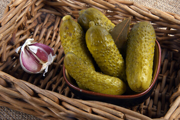 close up of the pickled cucumber in basket rural