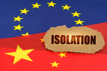 On the flags of China and the European Union lies a cardboard plate with the inscription - isolation