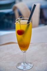 Aperitif with cherry inside, Bellini happy hour