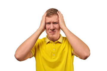 Upset young male in yellow T-shirt clutched at head, forgetful man, isolated on white background