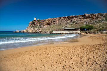 Fototapeta na wymiar Ghain Tuffieha Bay in Malta, beach in the morning