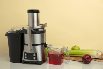 Kitchen electric juicer extractor  on non isolated background
