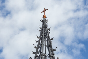 Neo Gothic Church spire of the Holy Apostles Peter and Paul in Shuvalov Park, St Petersburg, Russia
