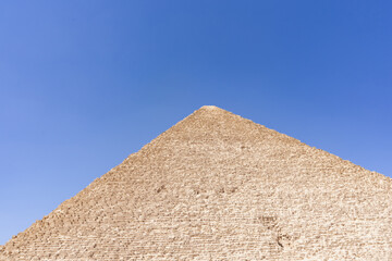 Fototapeta na wymiar The Great Pyramid of Giza is a defining symbol of Egypt and the last of the ancient Seven Wonders of the World. The massive temple complex of Karnak was the principal religious center of the god Amun.